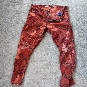 Orange cheetah jeans ripped